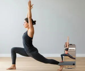 A photo of a person holding a standing lunge position with arms overhead to stretch the hip flexors.