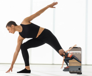 A photo of a side lunge stretch focusing on the outer hips and hip abductor muscles.