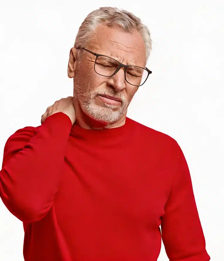Man in red shirt experiencing neck pain discomfort